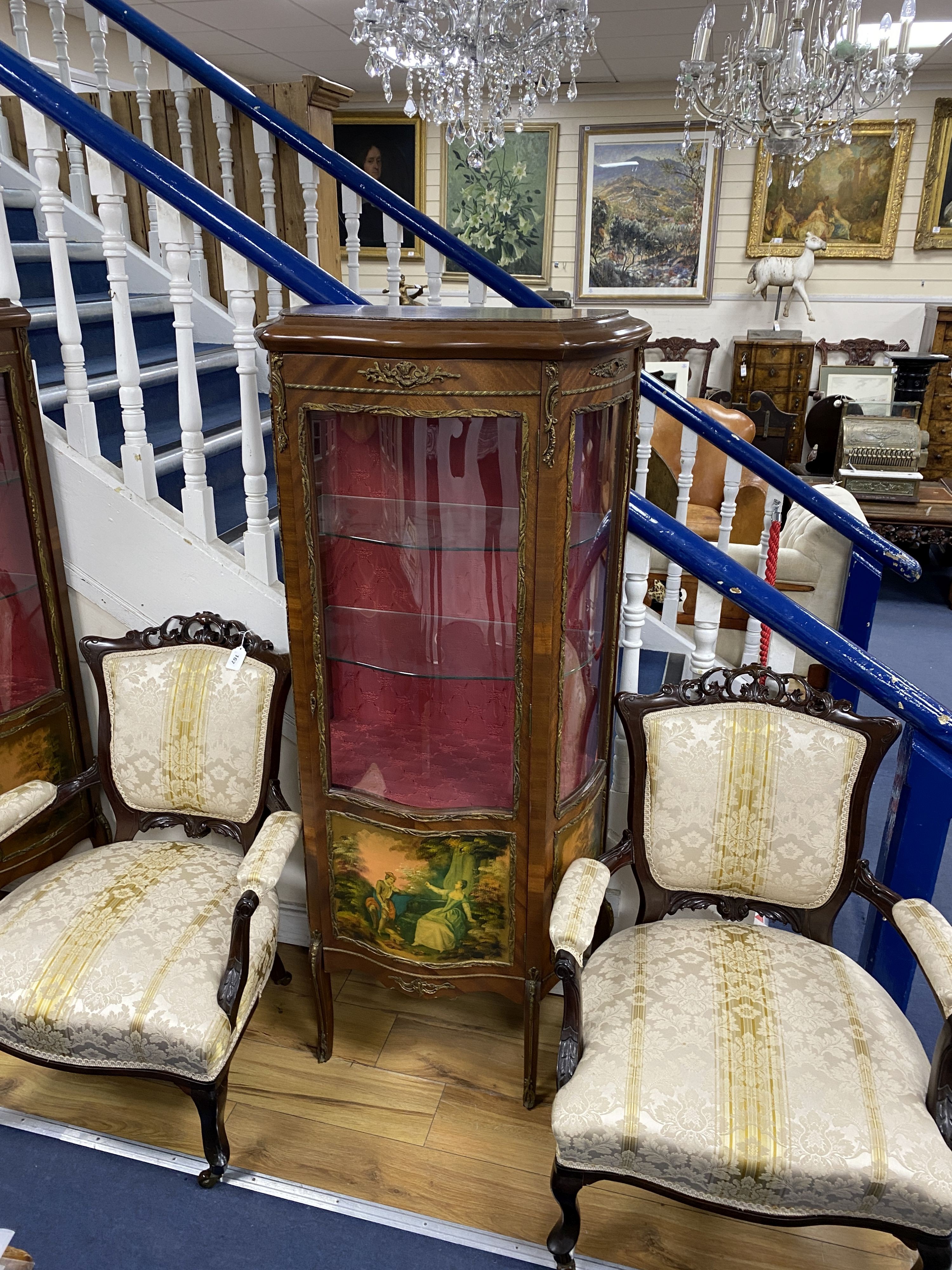 A pair of reproduction gilt metal mounted Vernis Martin style serpentine front vitrine, width 68cm, depth 36cm, height 152cm